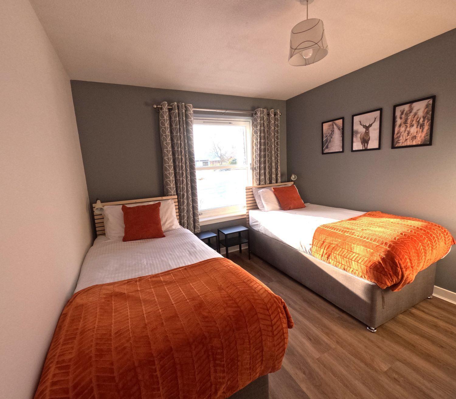 Orange Squirrel Lodge Aviemore Bagian luar foto